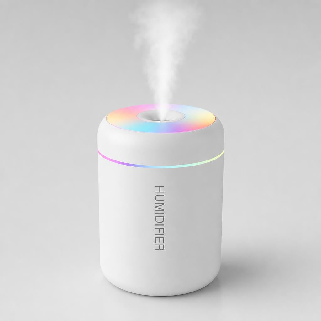 White mini humidifier, front view, with a fine mist rising